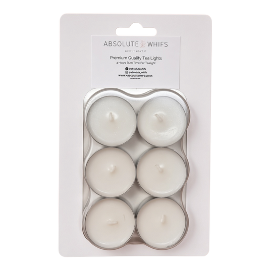 Unscented Tea Lights - 6 Pack in white wax, arranged in clear plastic packaging with six visible cotton wicks