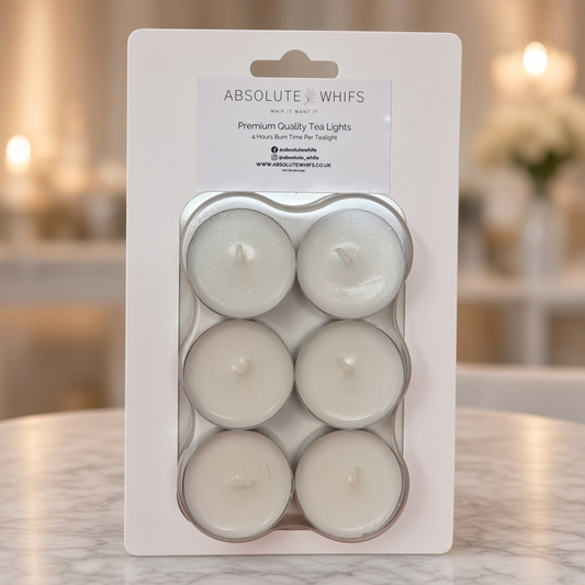 Unscented Tea Lights - 6 Pack, six white wax tealights with short wicks in clear plastic packaging