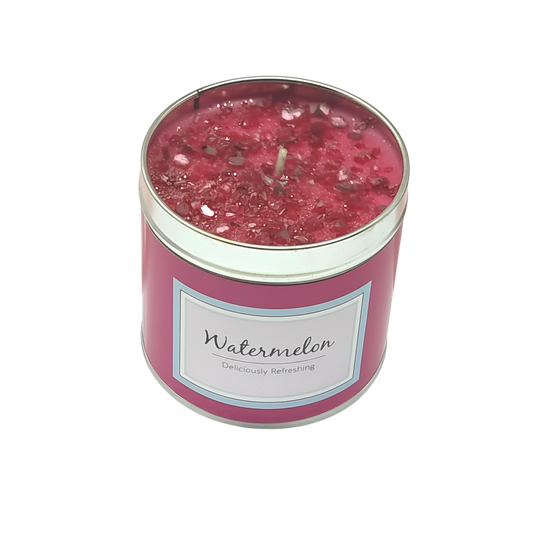 Watermelon Scented Candle in a pink container with glittery red wax topping and a centered wick, labeled Watermelon