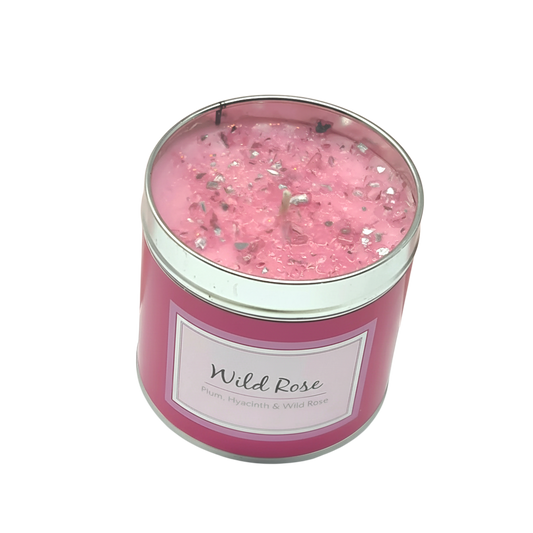 Wild Rose Scented Candle in pink jar with sparkling crystal-like embellishments and floral scent label